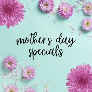 Happy Mothers Day graphic with light blue background and pink flowers scattered throughout